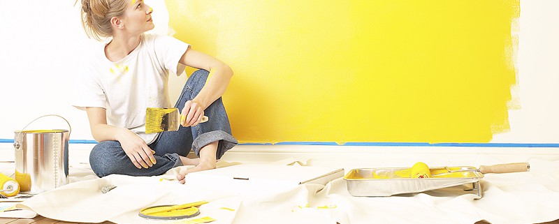 lady-painting-wall-yellow-fresh-new-website